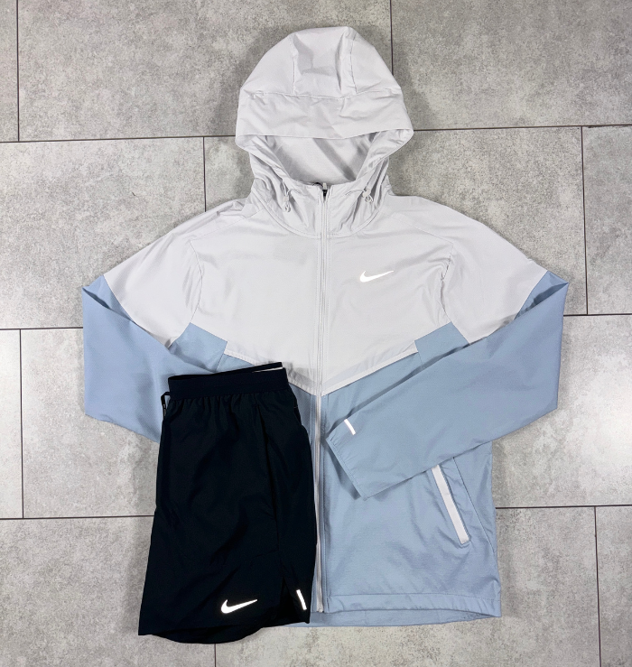 Nike light blue windbreaker deals