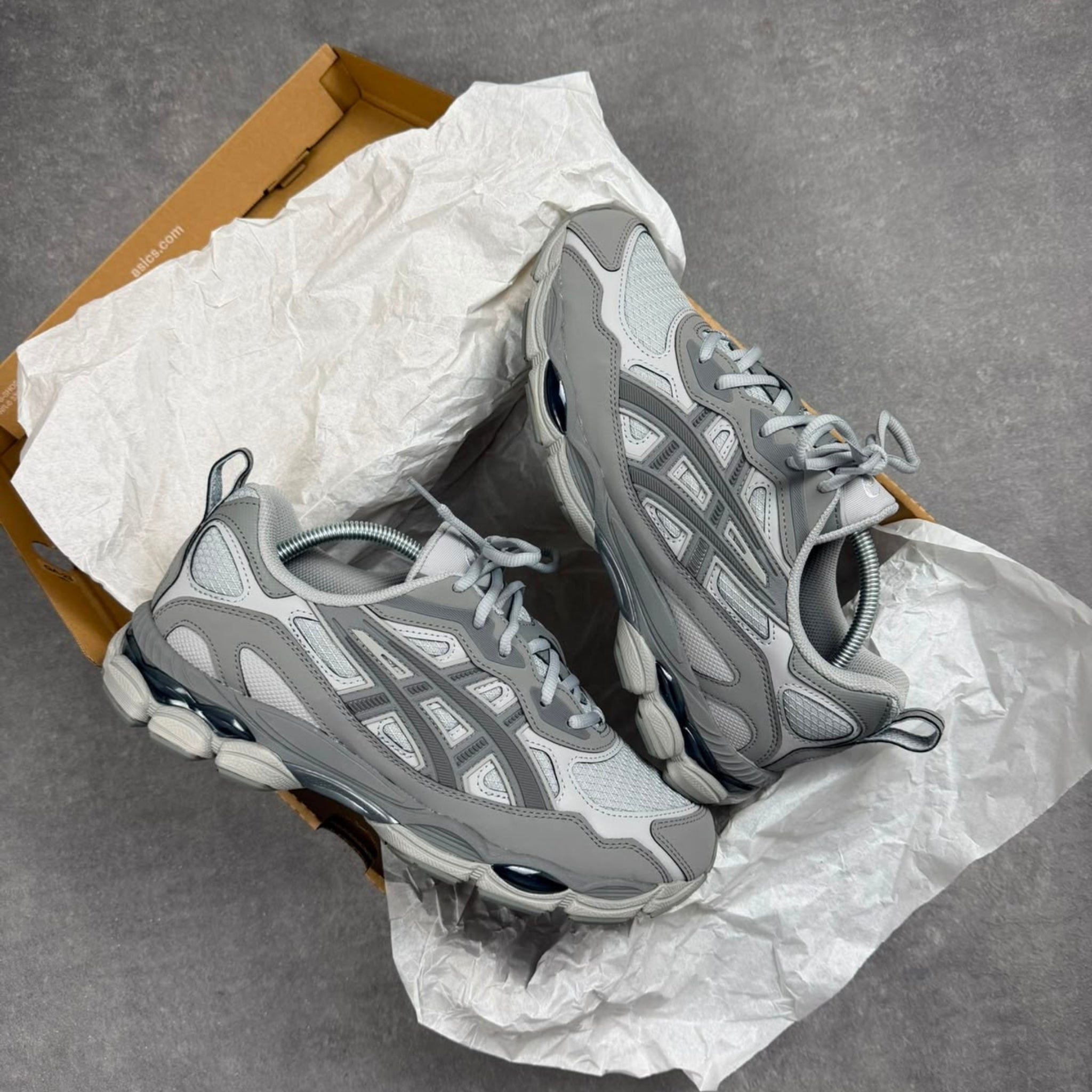 Pair of ASICS Gel-NYC RGD Cement Grey trainers