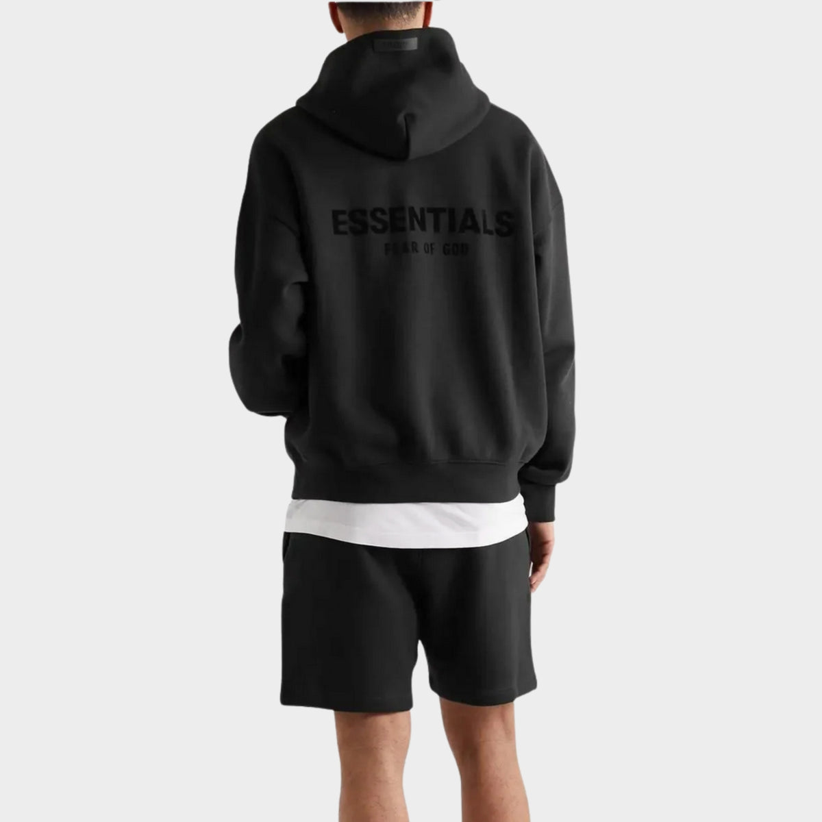 Fear of God Essentials Hoodie Black SS22 rear view showing the back branding and oversized shape