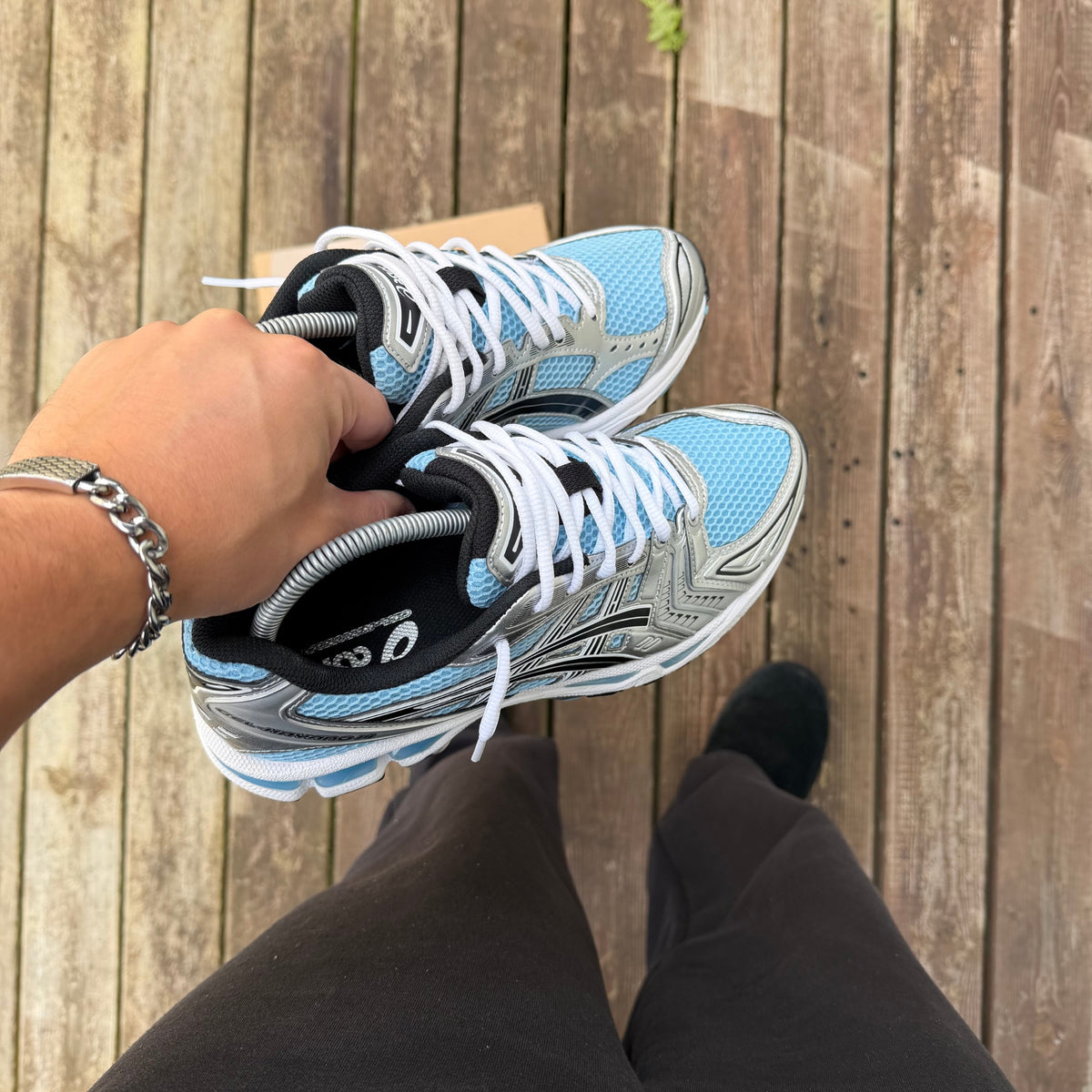 Gel-Kayano 14 Pure Silver Arctic Sky trainers viewed from above showing the laces tongue and mesh construction