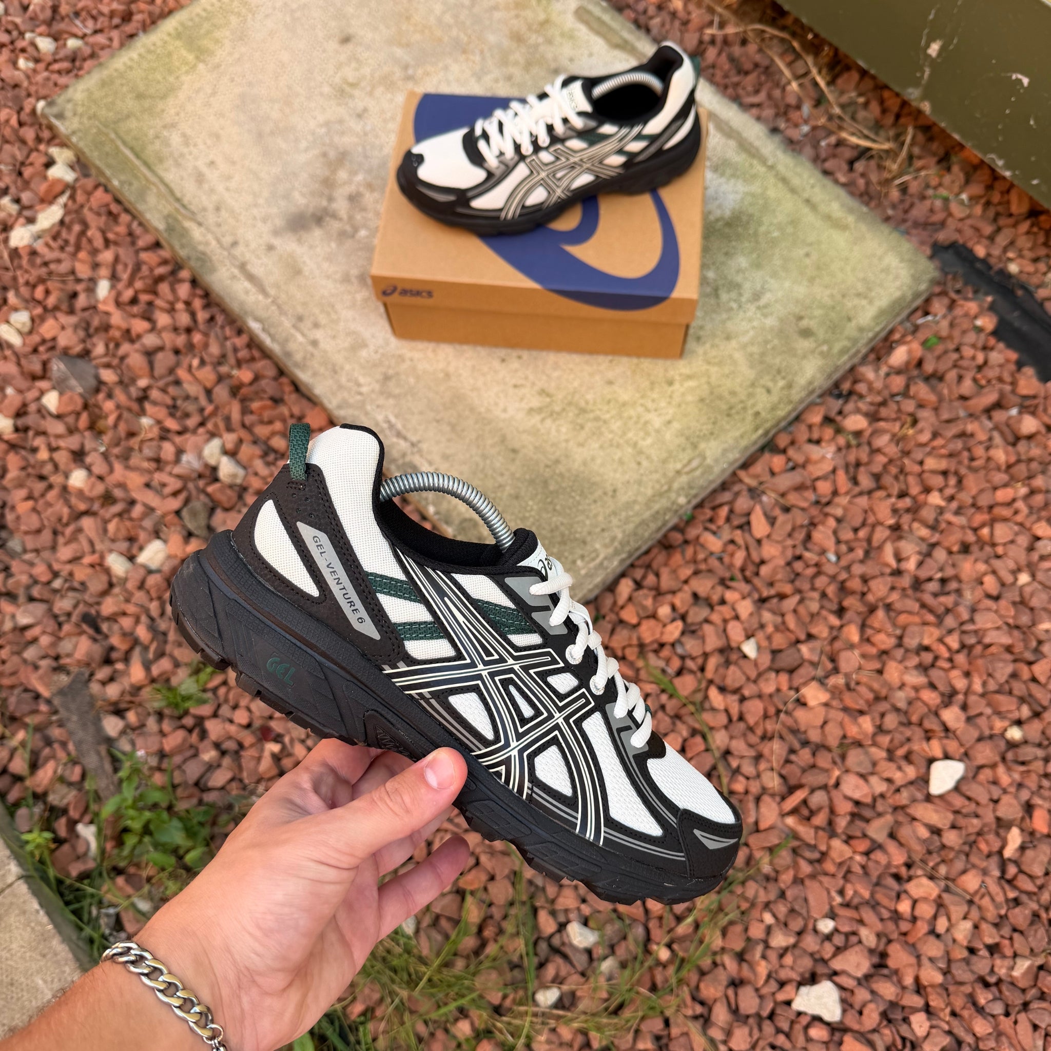 Grey ASICS Gel-Venture 6 trainers showing layered upper
