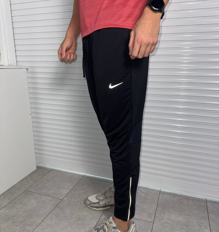 Nike Elite Dri-FIT Phenom Black running pants worn on body