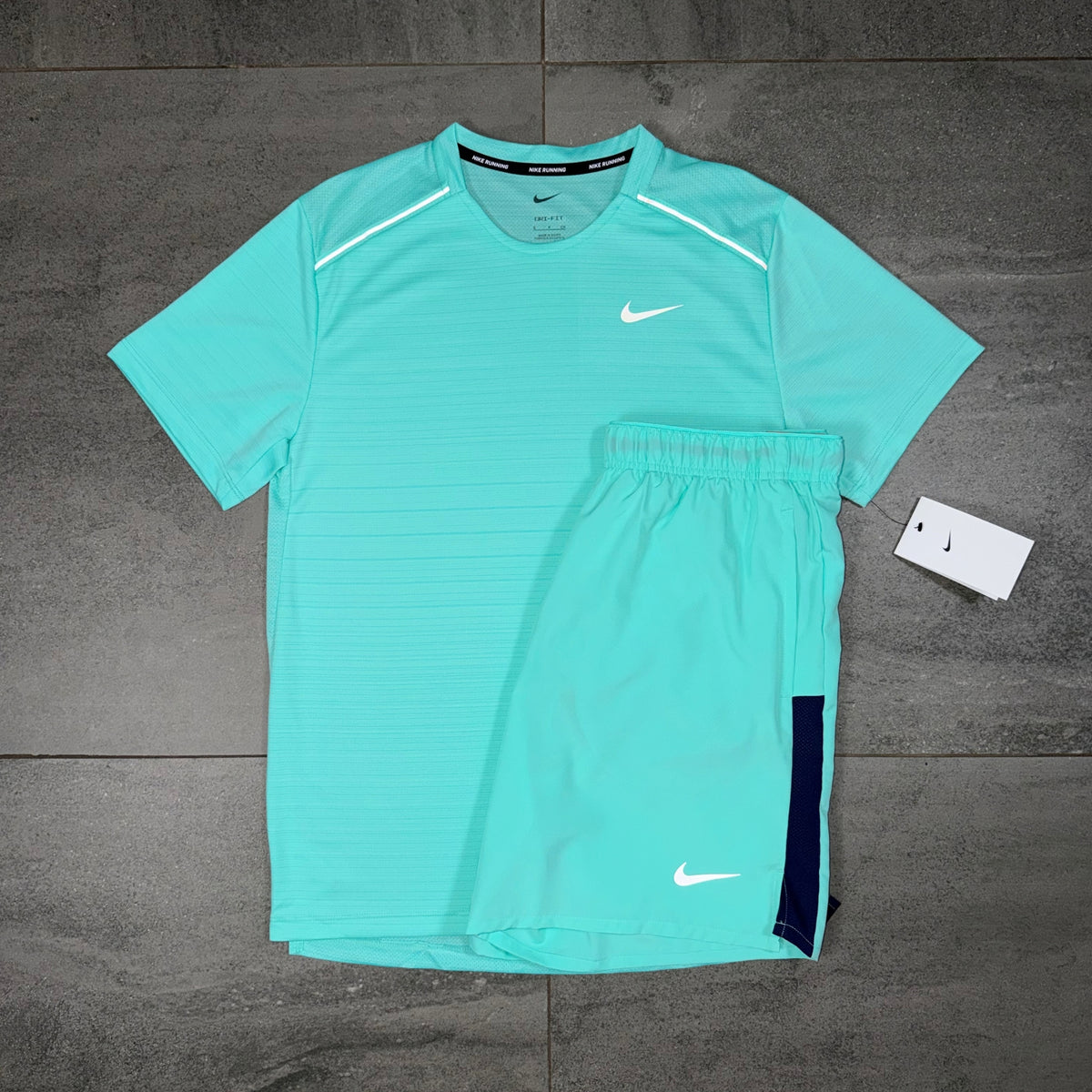 Men's Nike Hyper Turquoise activewear outfit featuring a Miler T-shirt with matching running shorts