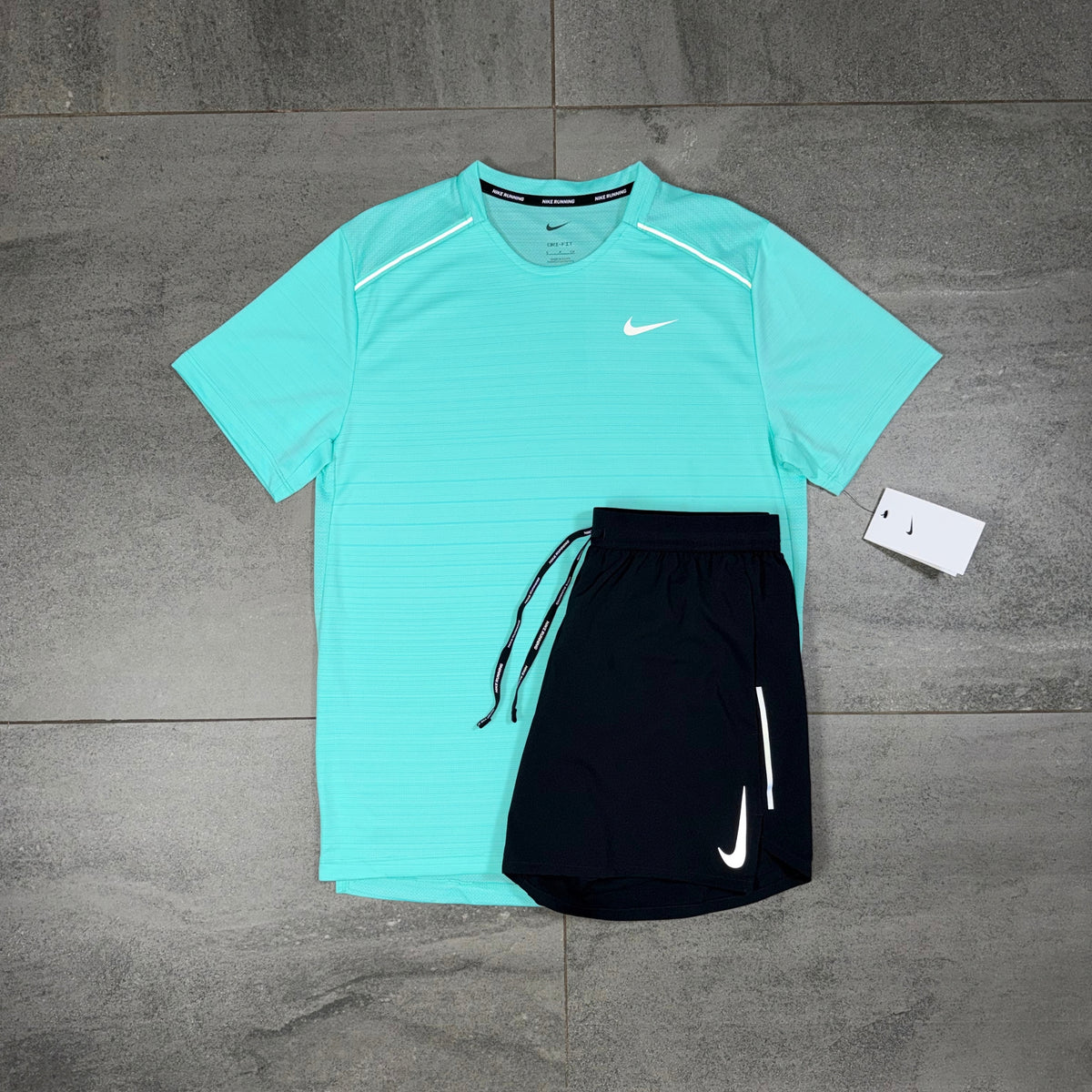 Nike Miler Hyper Turquoise T-shirt paired with black OG Flex shorts as a contrasting men's running set
