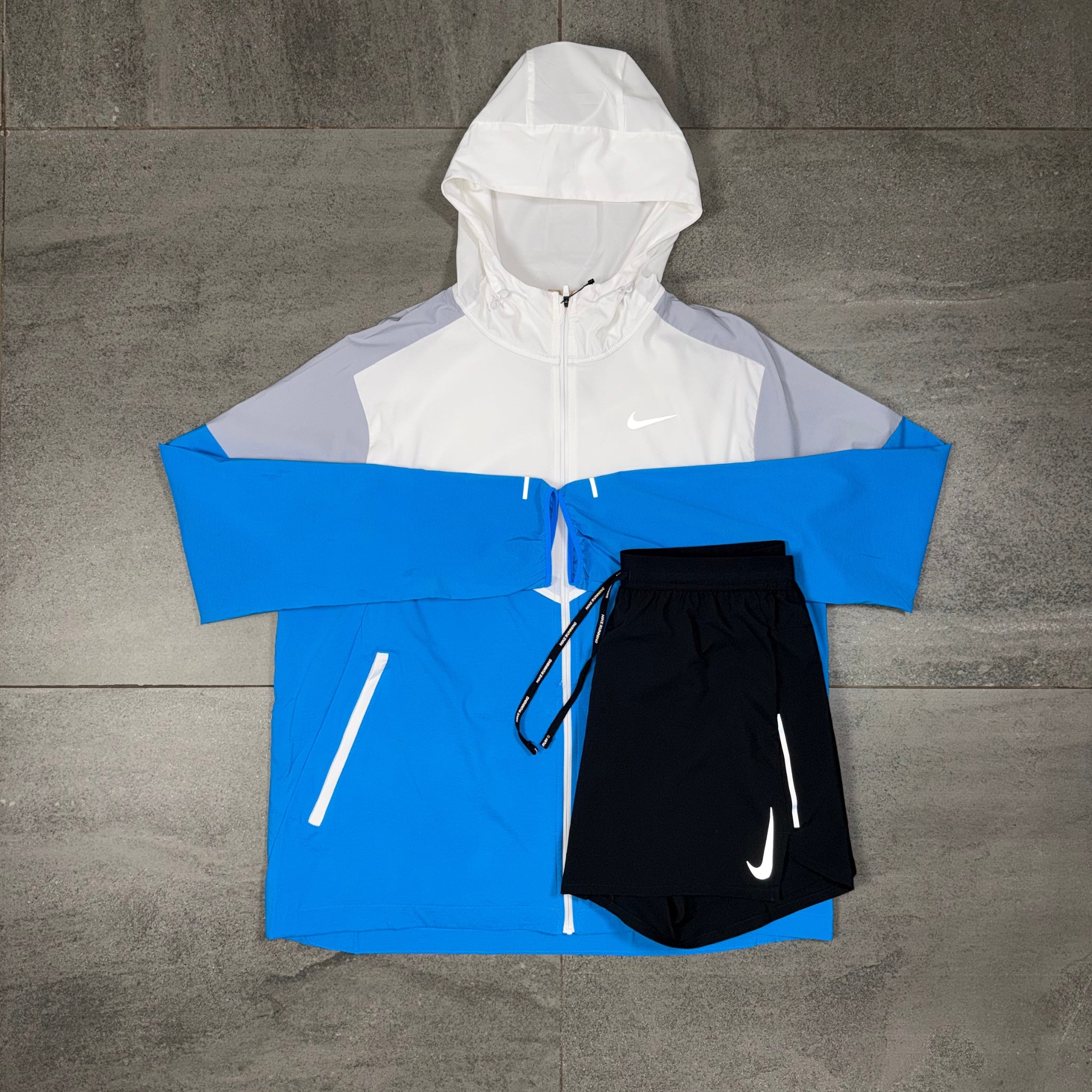 Nike OG Flex black shorts styled with the White Wolf Grey Windrunner jacket