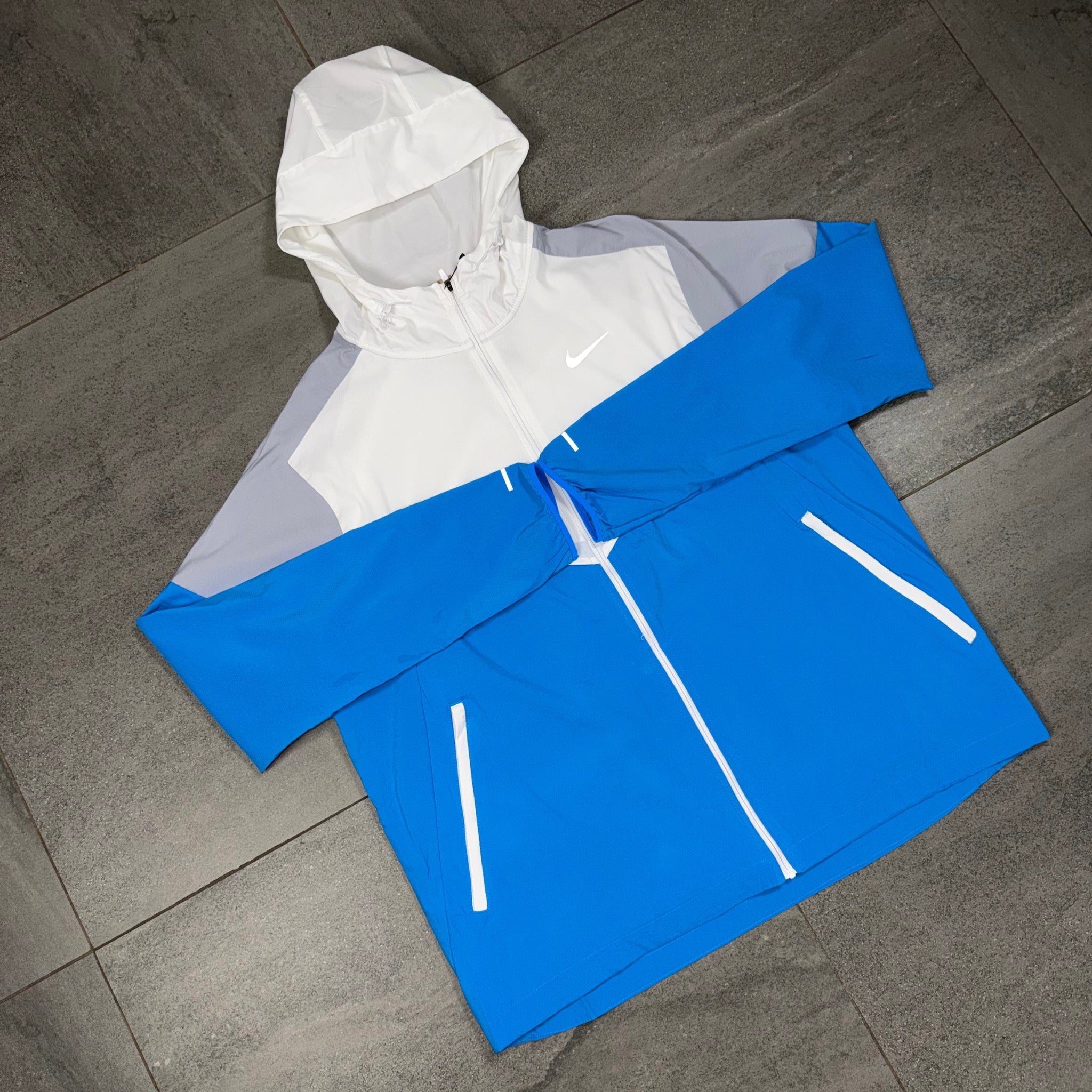 White Wolf Grey and Blue Nike Windrunner jacket