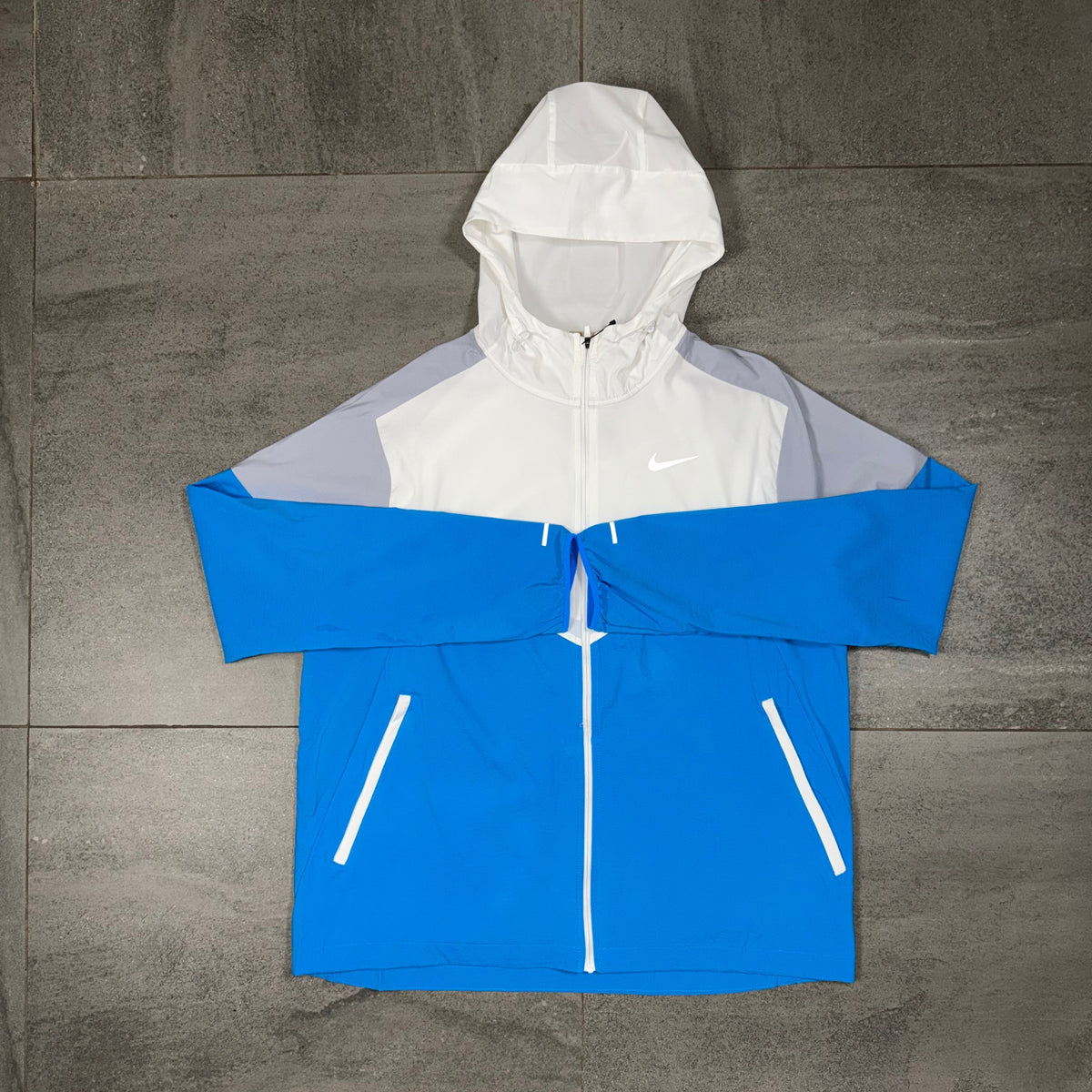 White Wolf Grey and blue Windrunner jacket from the Nike OG Flex outfit