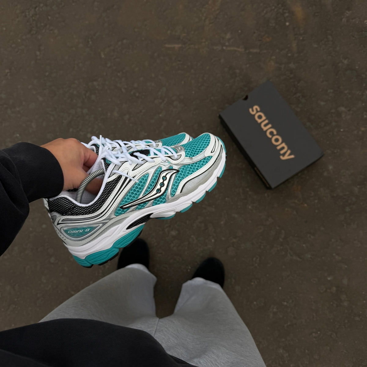 Saucony ProGrid Omni 9 Tranquil lifestyle view with white laces