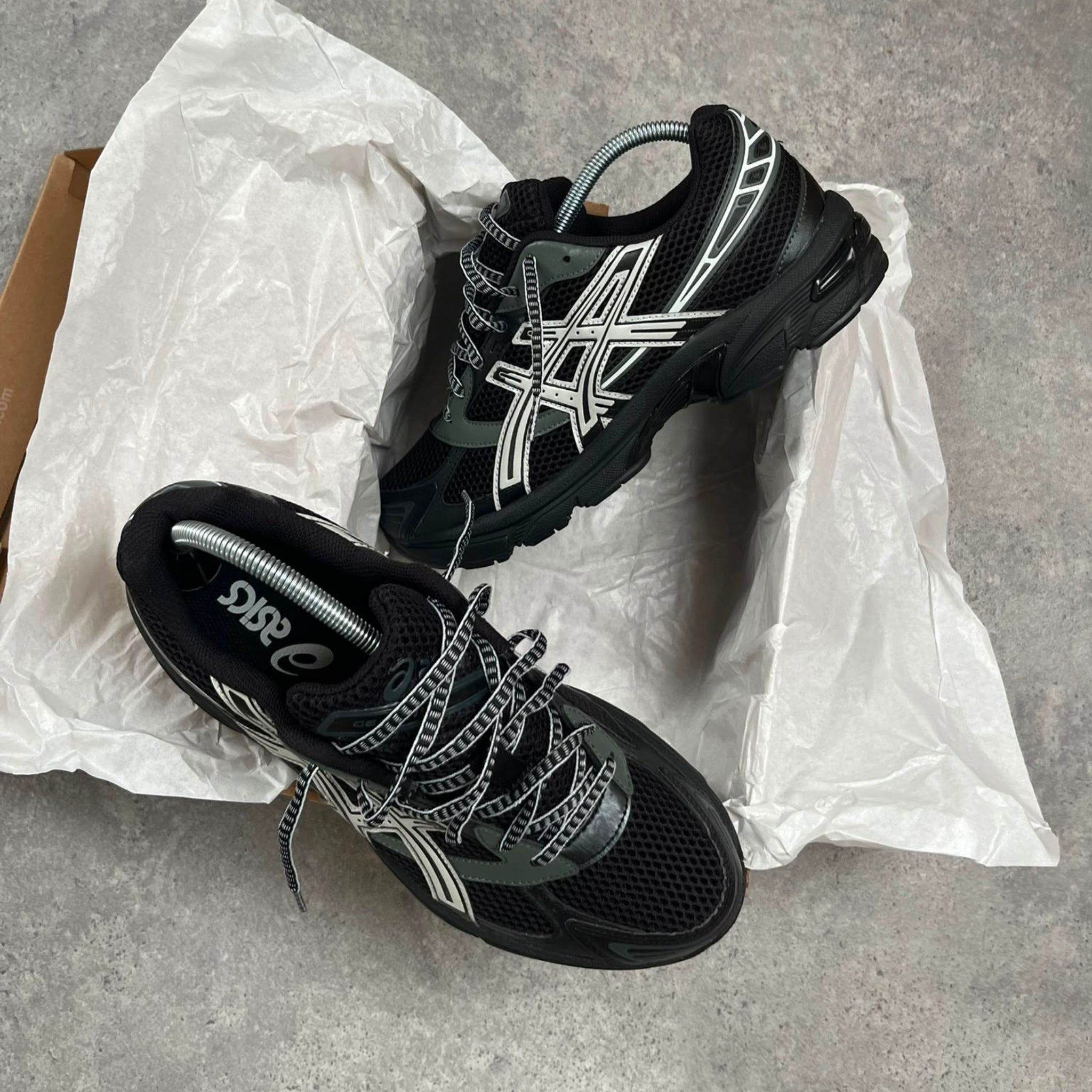 Pair of ASICS Gel-1130 Black Glacier Grey trainers