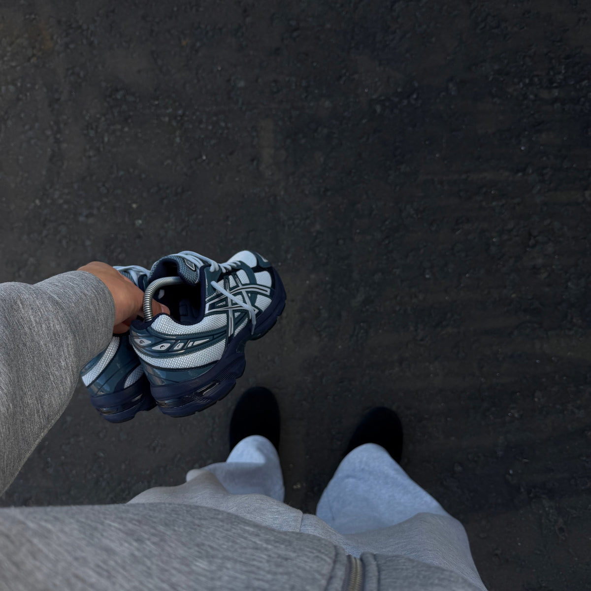 ASICS Gel-1130 Piedmont Blue trainers worn on feet showing the retro running silhouette