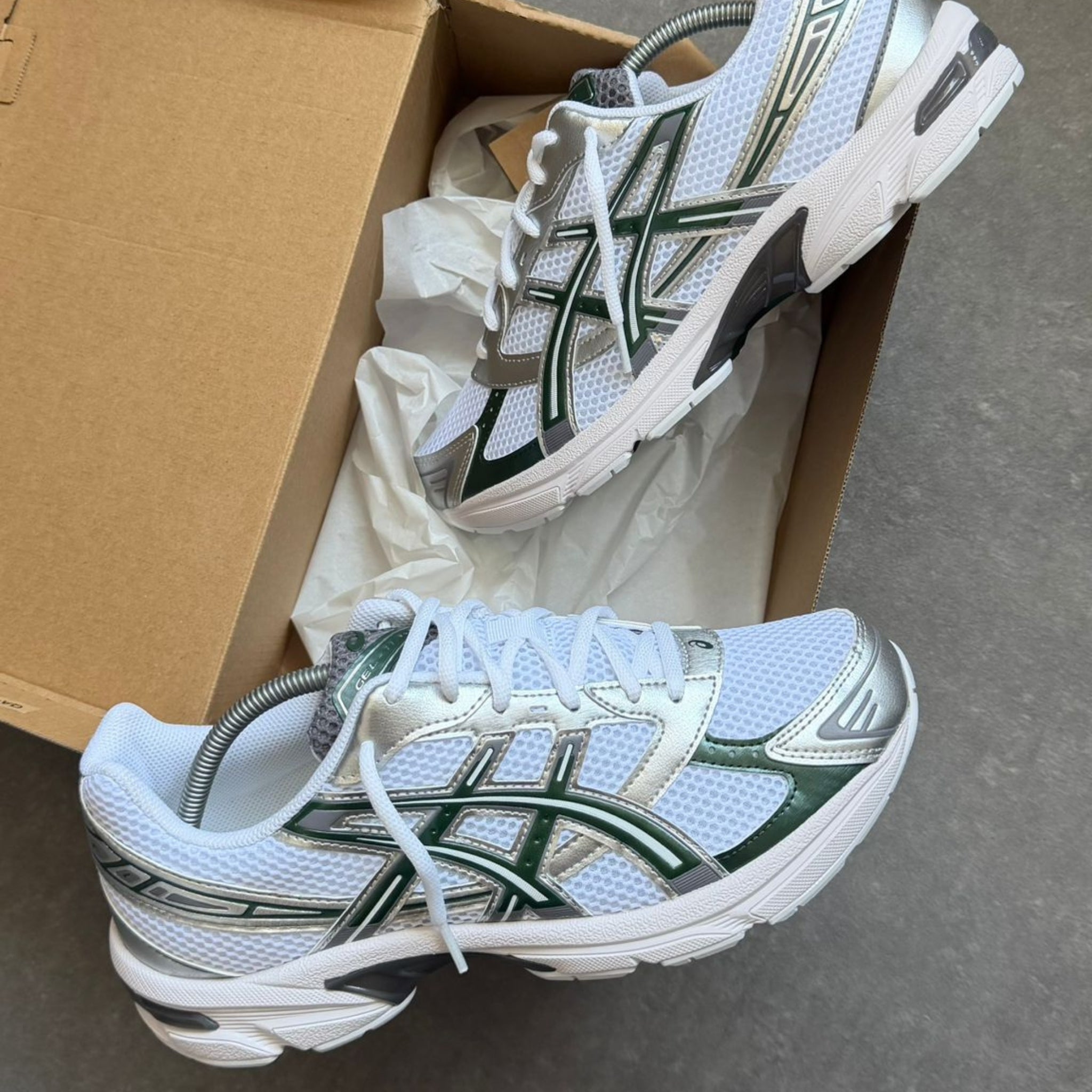 Pair of ASICS Gel-1130 White Forest Night trainers