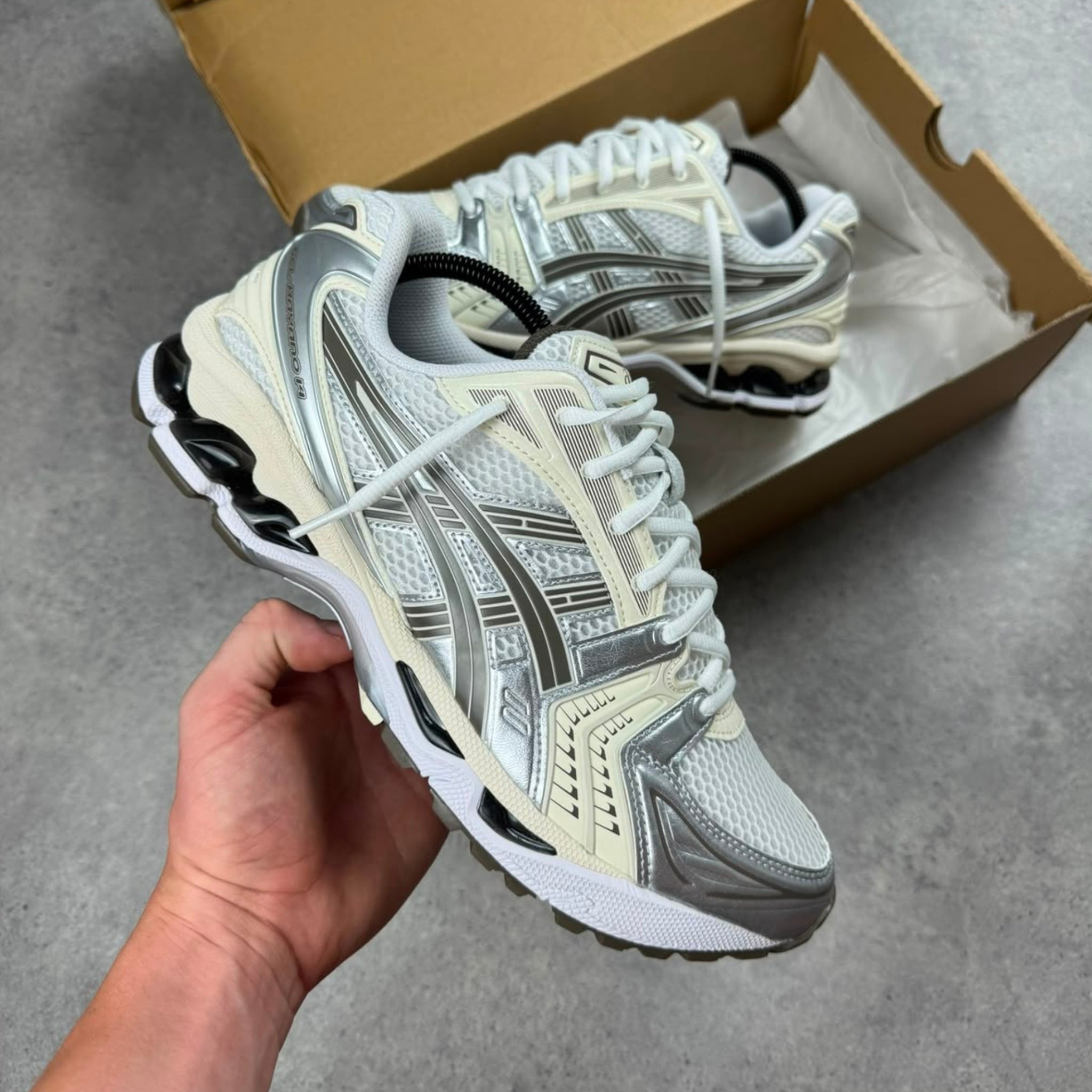 Pair of ASICS Gel-Kayano 14 White Ivory trainers