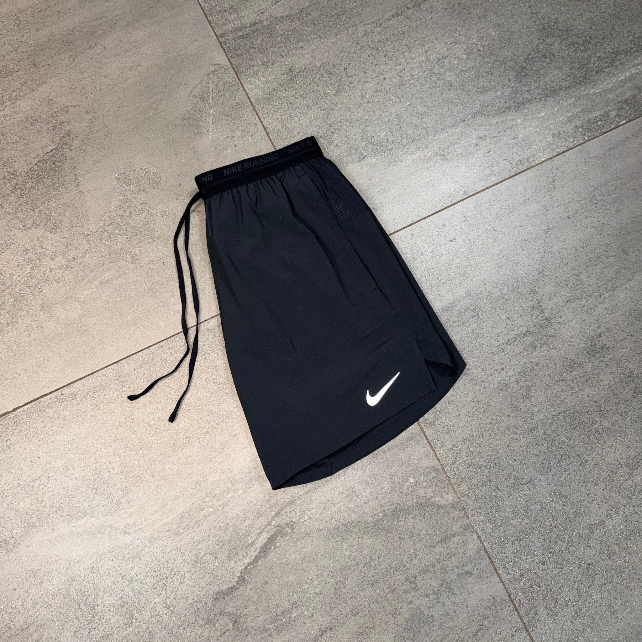 Black Nike Flex Stride running shorts with drawcord