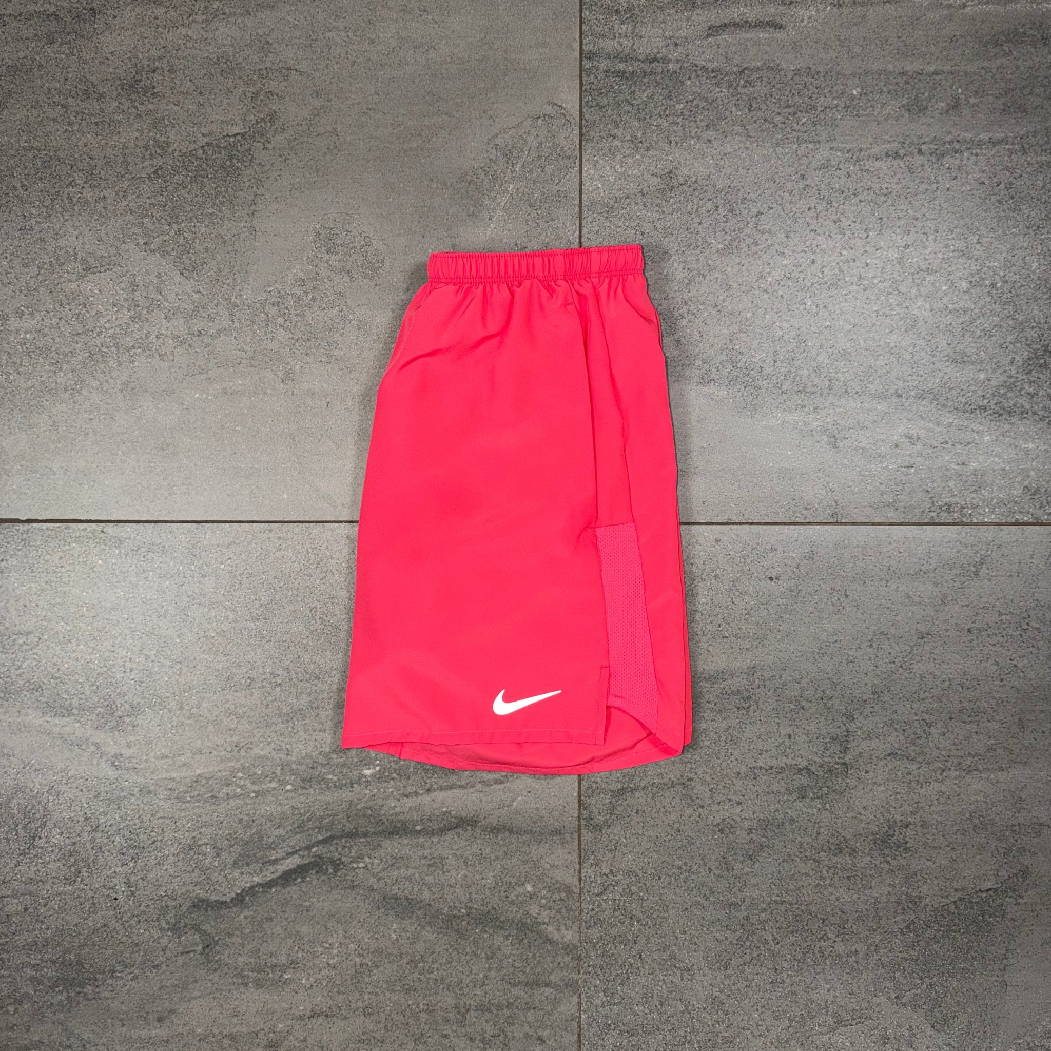 Nike Challenger running shorts in Aster Pink