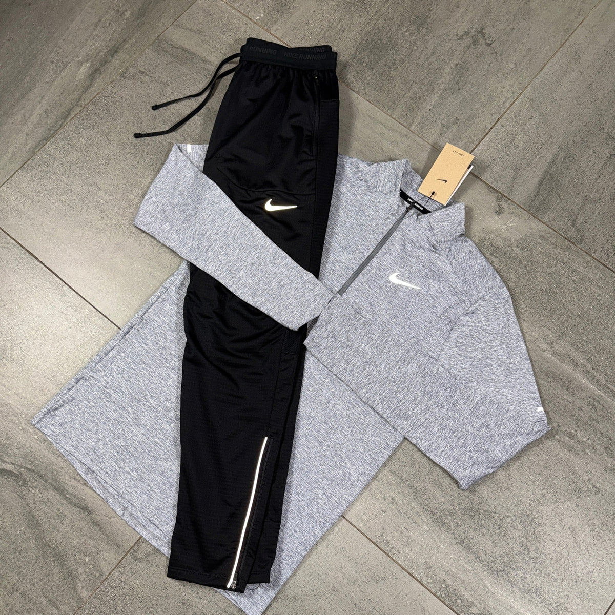 Nike Element Grey and Black Running Set displayed flat