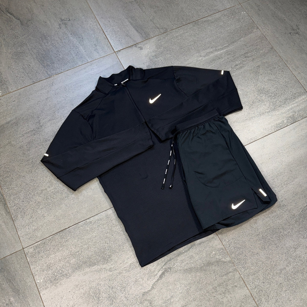 Nike Flex Shorts and Element Black running top displayed together