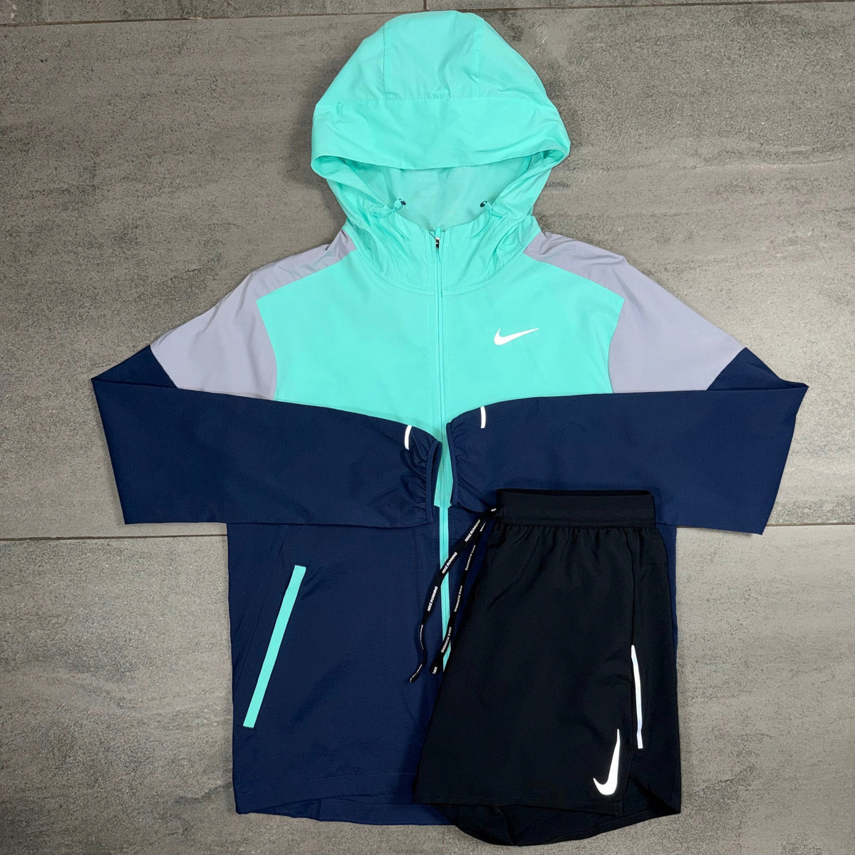 Nike Hyper Turquoise Windrunner with Black OG Flex Shorts front view