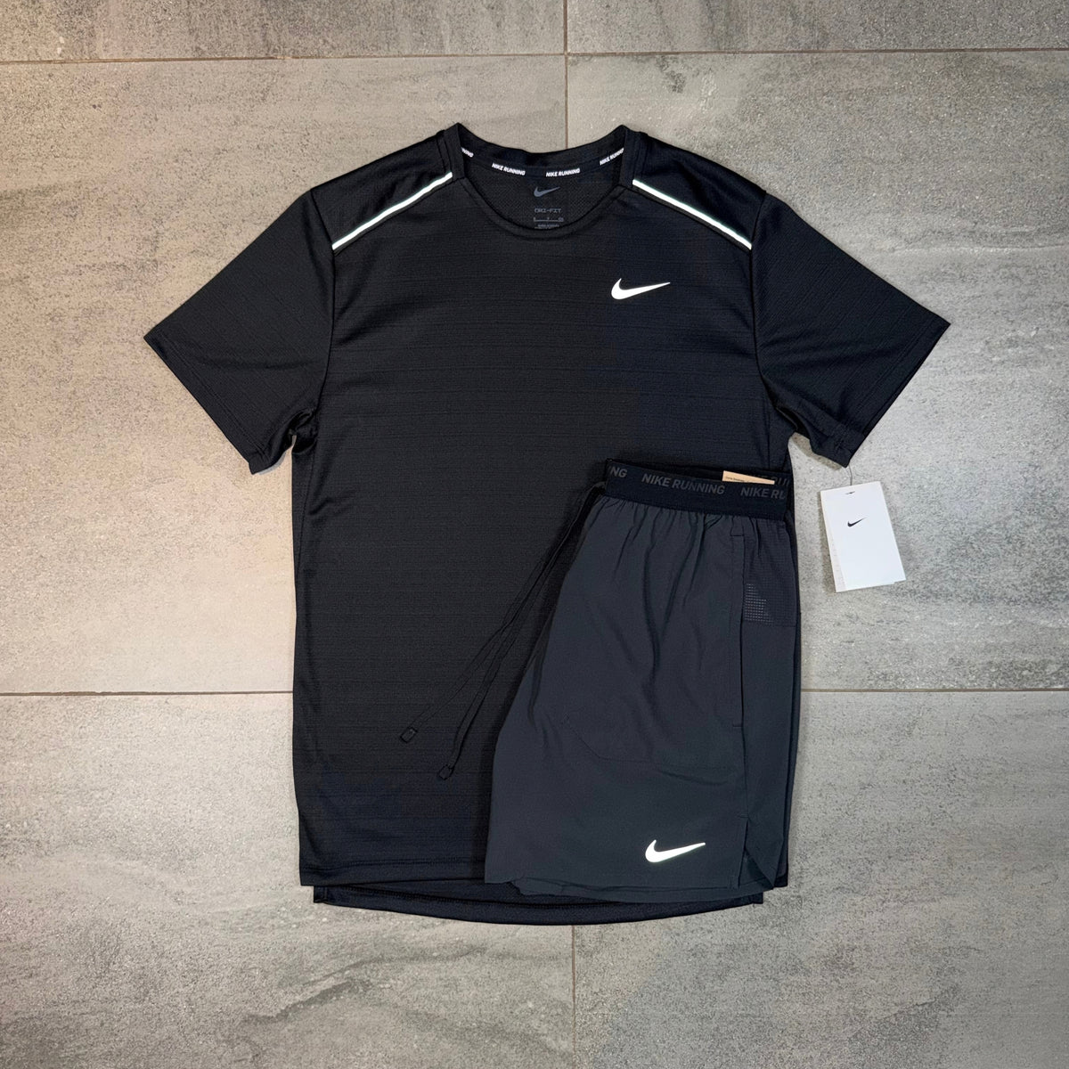 Nike Miler black T-shirt paired with black Flex Stride shorts as a complete men's running outfit