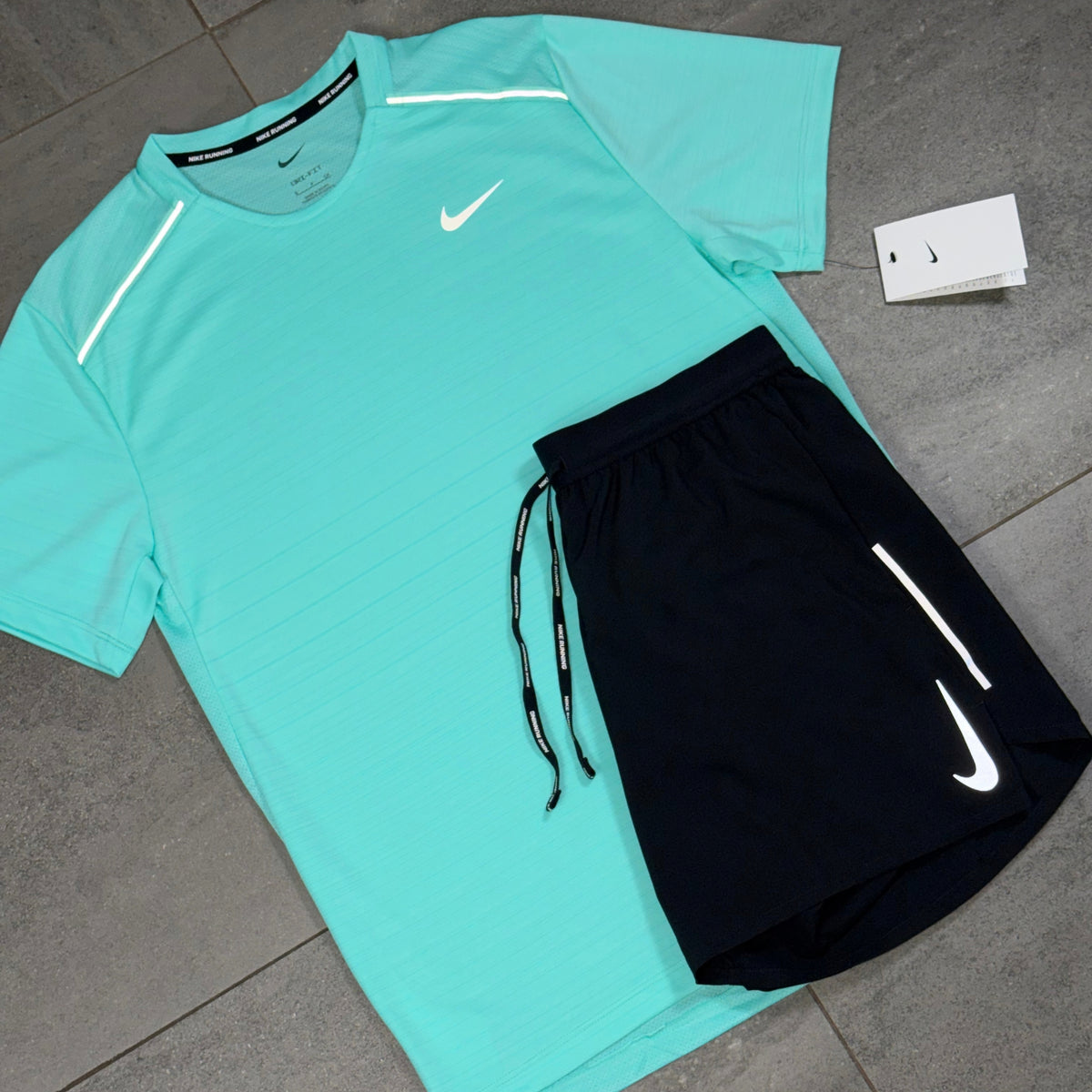 Men's turquoise and black Nike activewear combination featuring Miler shirt and lightweight OG Flex shorts