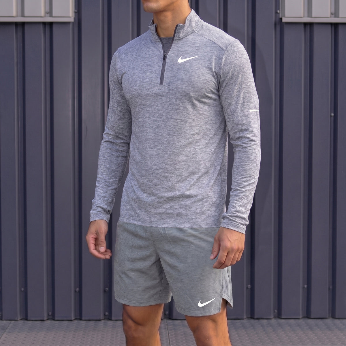 Nike Grey 1/4 Zip Running Top and Challenger Shorts front model view