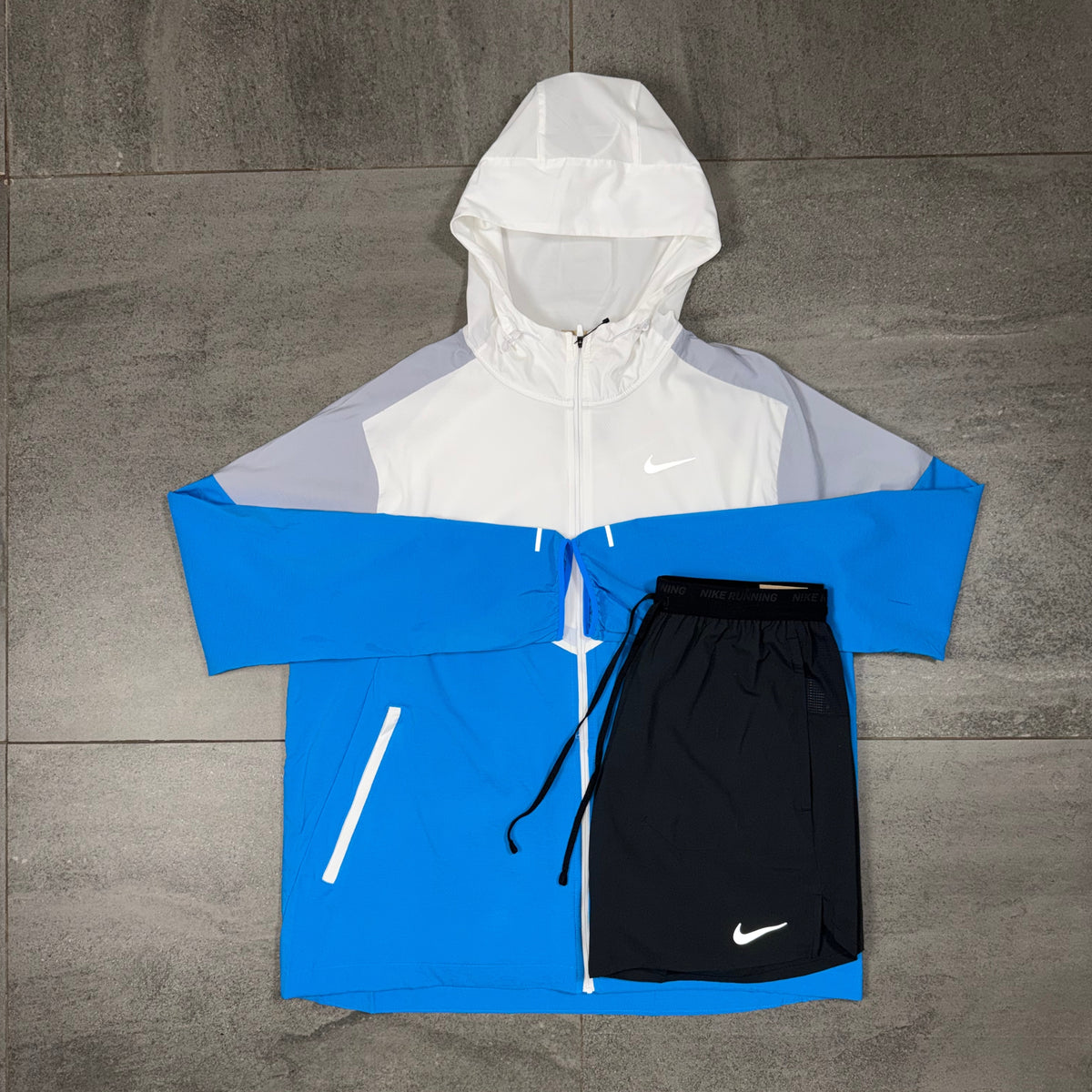 Nike windbreaker jacket in white grey and blue