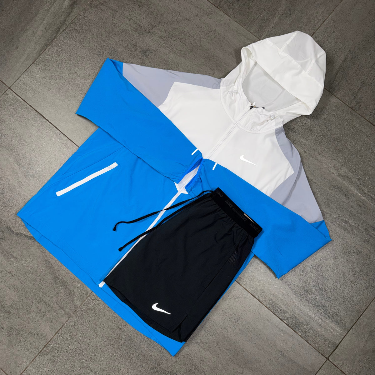 Nike Windrunner jacket with black Flex Stride shorts