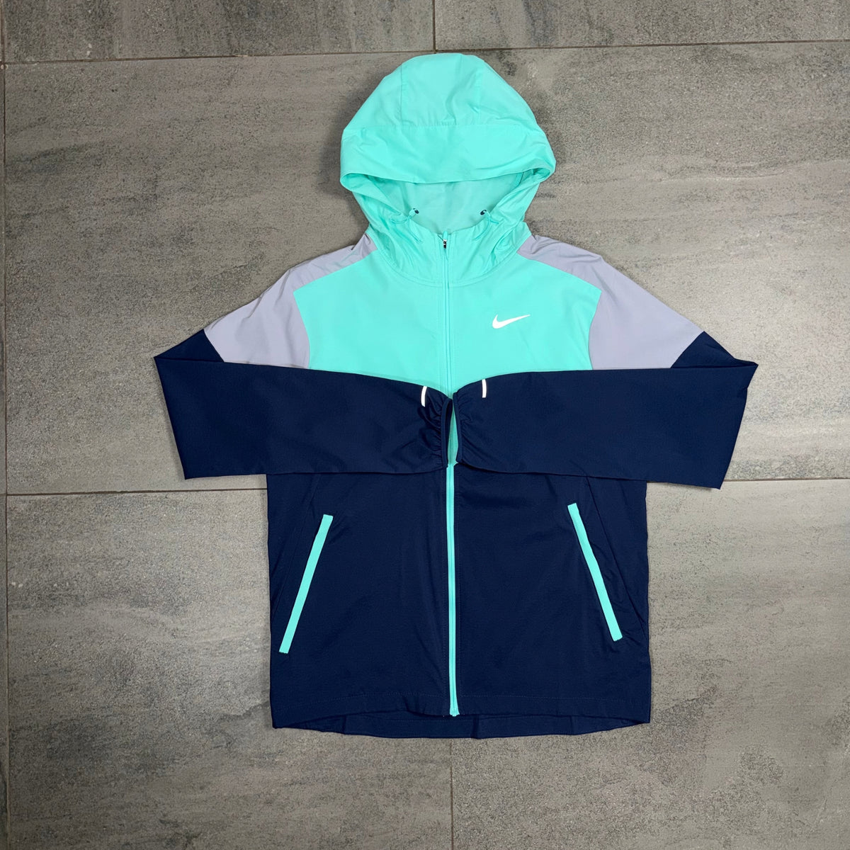 Nike Windrunner Hyper Turquoise and Black jacket front view