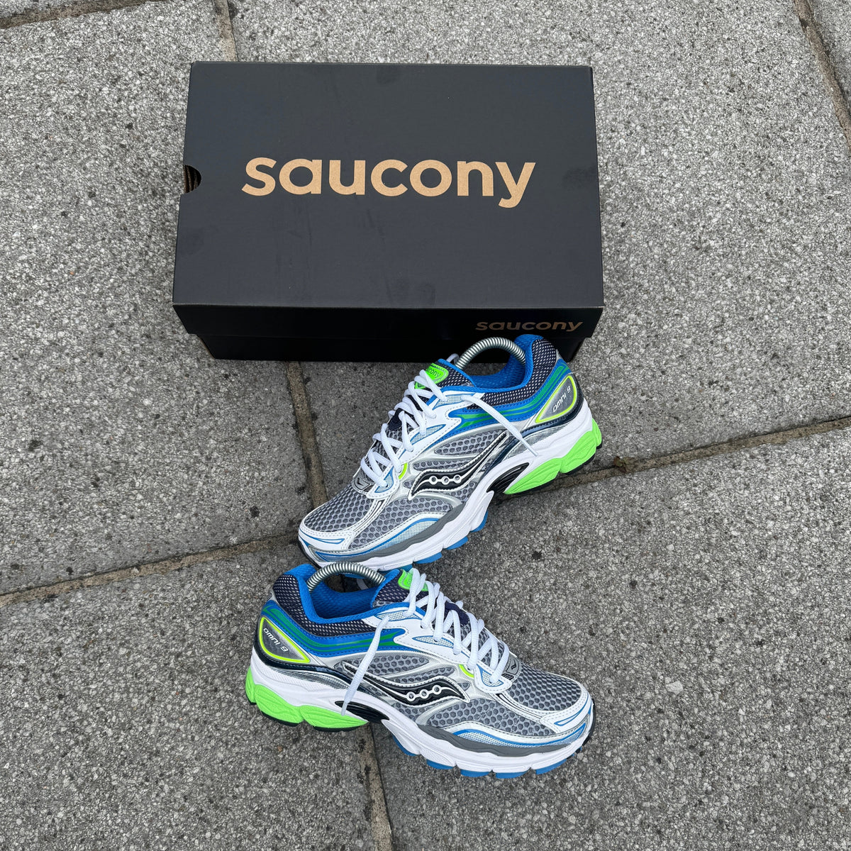 Pair of Saucony ProGrid Omni 9 Grey Slime Blue trainers