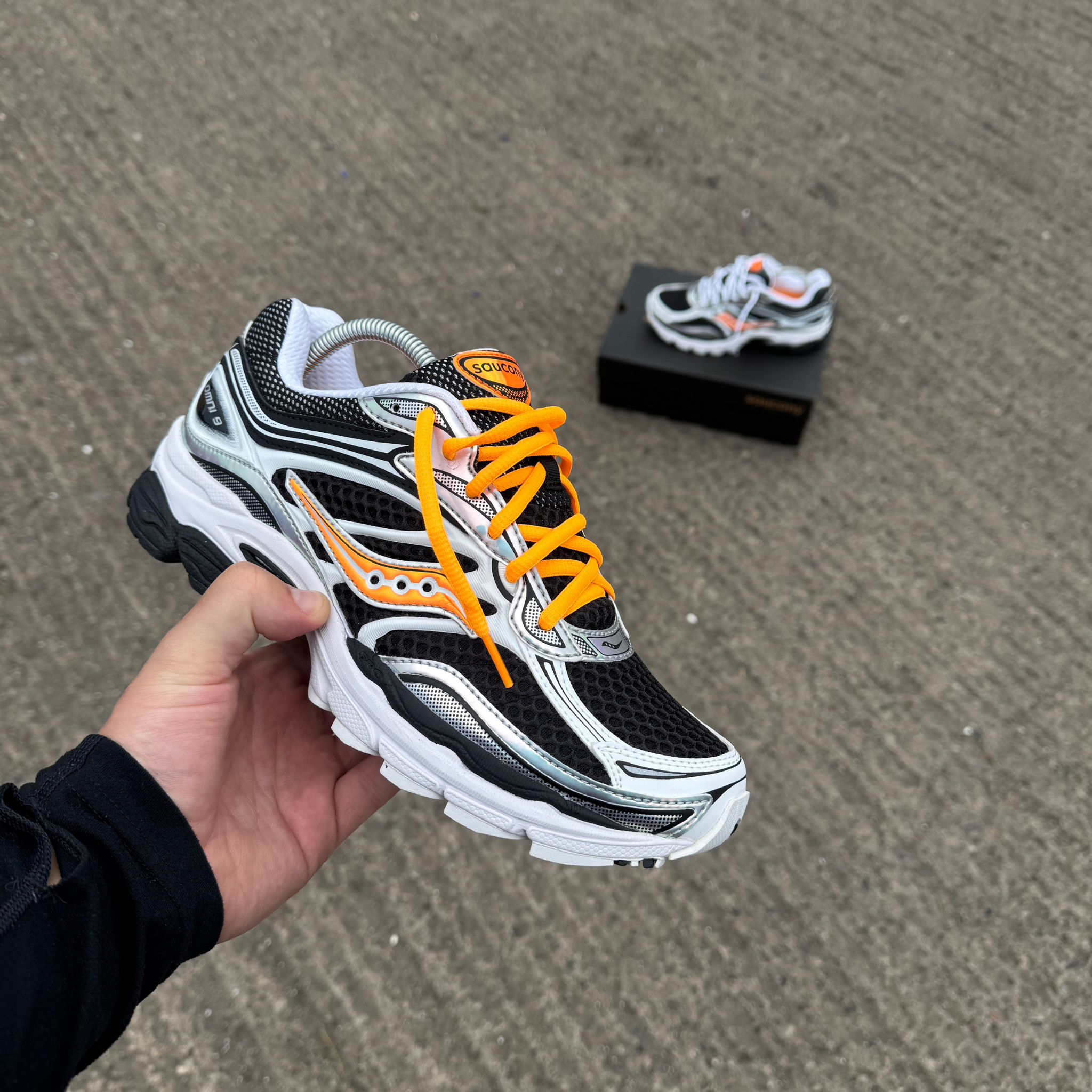Saucony ProGrid Omni 9 White Orange side view